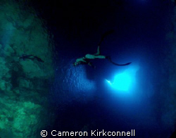 Free diving the caves of Micronesia by Cameron Kirkconnell 